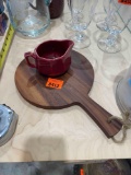 Red creamer and cutting board