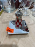 Checkard salt shaker and silver/white square plate