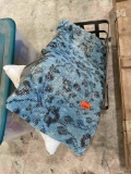 Metal basket with pillows