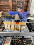 Metal tin with nails, and dust pans