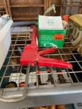 Caulking gun and screws