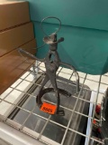 Cowboy with lasso made from tools