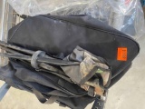 Black bag and camo hunting chair