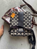 Cowgirl purse and Coach purse