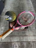 Tennis racket, football, soccer ball and shoes
