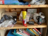 Items on shelf. tuff stuff, first aide kit, and more