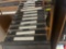 various VHS tapes and storage drawers