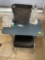 TV tray; trashcan; foot stool; tissues; water bottle; misc
