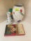 mystery book; decorative vases; bug spray