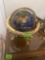 globe with rotating rings