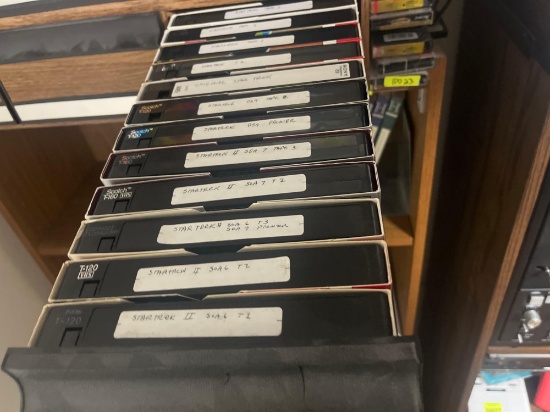 various VHS tapes and storage drawers