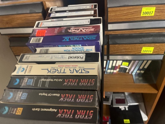 various VHS tapes and storage drawers