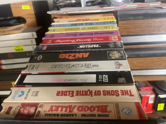 various VHS tapes and storage drawers