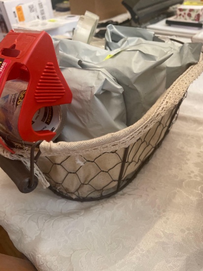 basket of Scotch tape and packing tape