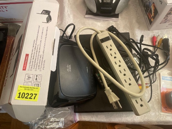 remote; extender; power strip; Sony DVD player; misc