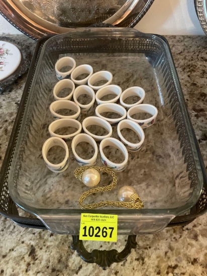 silver casserole dish holder; casserole side; napkin rings