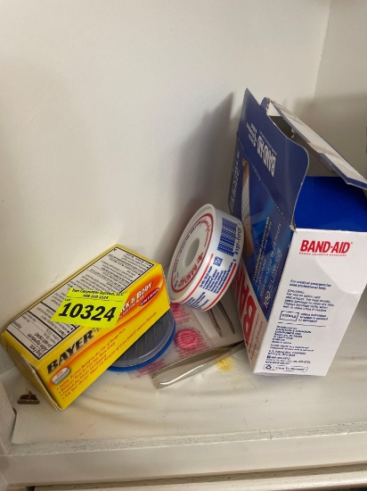 bandages; Bayer meds; sewing needle; tweezers; misc