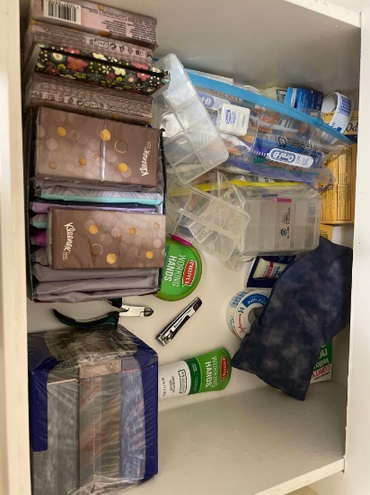 travel tissues; pill boxes; travel bag; first aid tape; misc