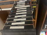 various VHS tapes and storage drawers
