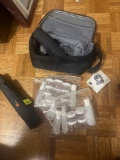 2 umbrellas and travel kit