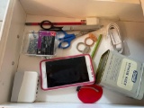 scissors; picture hangers; antique tins; Samsung phone