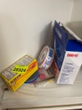 bandages; Bayer meds; sewing needle; tweezers; misc