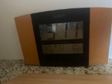 wooden cutting board; weather/calendar clock