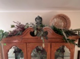 decorative foliage, angel statue with harp, wicker basket