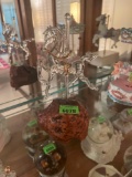 glass carousel horse on wood base