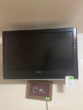 31 inch mounted Sony tv