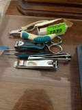 scissors; tweezers; nail clippers; misc