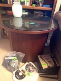 wooden round glass-top table