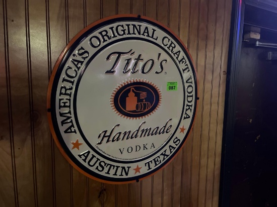 Titos vodka metal sign