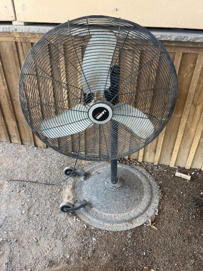 Lasko electric fan on stand