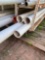 Lot contains sticks of PVC on BOTTOM SHELF ONLY *BUYER IS RESPONSIBLE FOR LOADING*