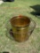 Brass trash can and wicker basket