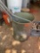 Metal barrel with miscellaneous aluminum pieces