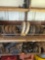 Tires on top shelf, lawnmower tires