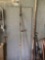 Pole saw blade attached to wood pole