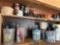 Funnels, paint, lighter fluid and other items on shelf