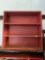 Red wooden bookcase Pick up after 1pm