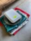 Table cloths, pie pan and tupperware ice cream container