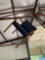 Wooden chair with blue vinyl cushion