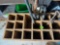 Wooden yard tool organizer with several misc items