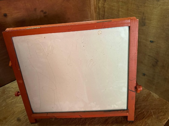 Small standing sign with chalkboard on one side and white board on the other