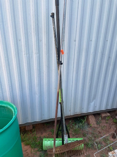 Garden weasle, rake and pooper scooper