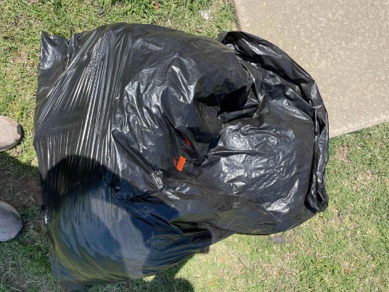 Trash bag full of pillows