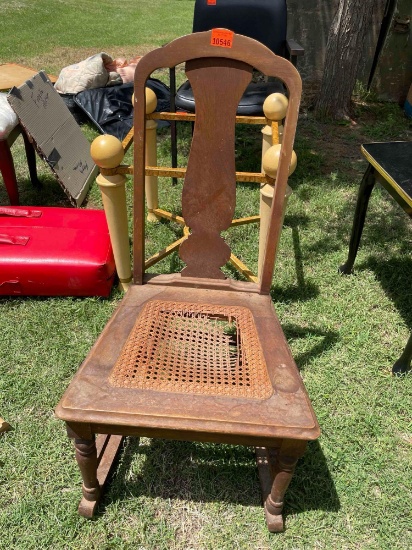 Wooden chair with wicker seat