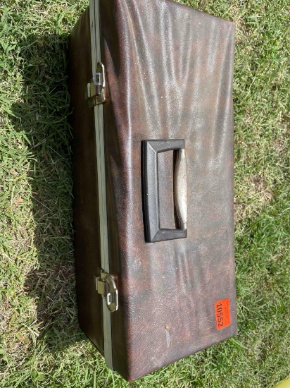 Carrying case with vintage farm tools