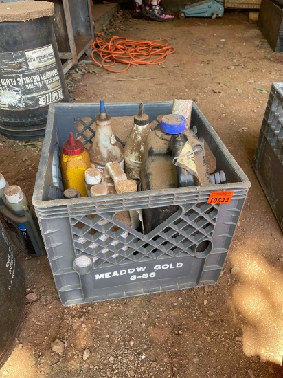 Milk crate with miscellaneous automotive additives
